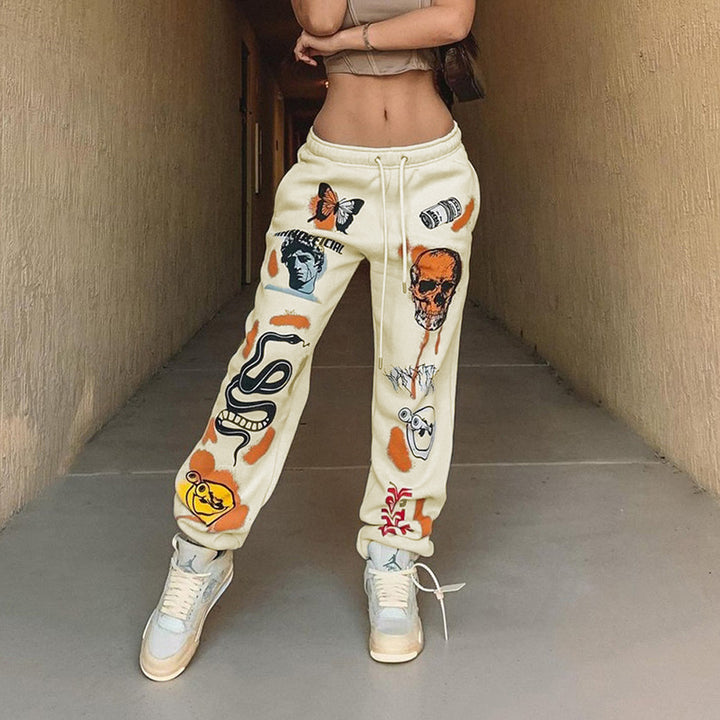 Women's graphic joggers with a high waistband, drawstring, and streetwear prints Amarae