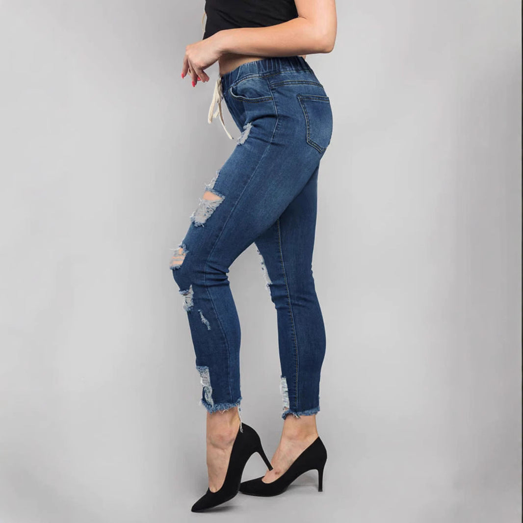 Women High-Waisted Destroyed Jogger Jeans with Elastic Drawstring Waistband and Cropped Frayed Hem Amarae