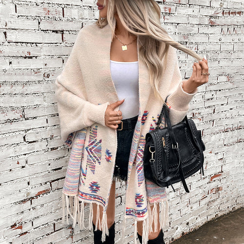 Wool poncho for women with colorful Navajo pattern and fringed hem Amarae