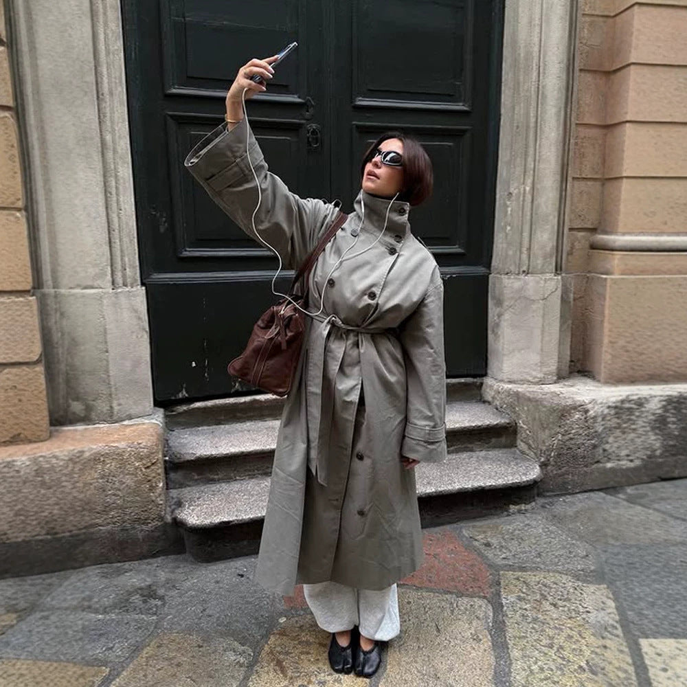 Women’s maxi trench coat with high stand-up collar, double-breasted button placket & waist belt Amarae