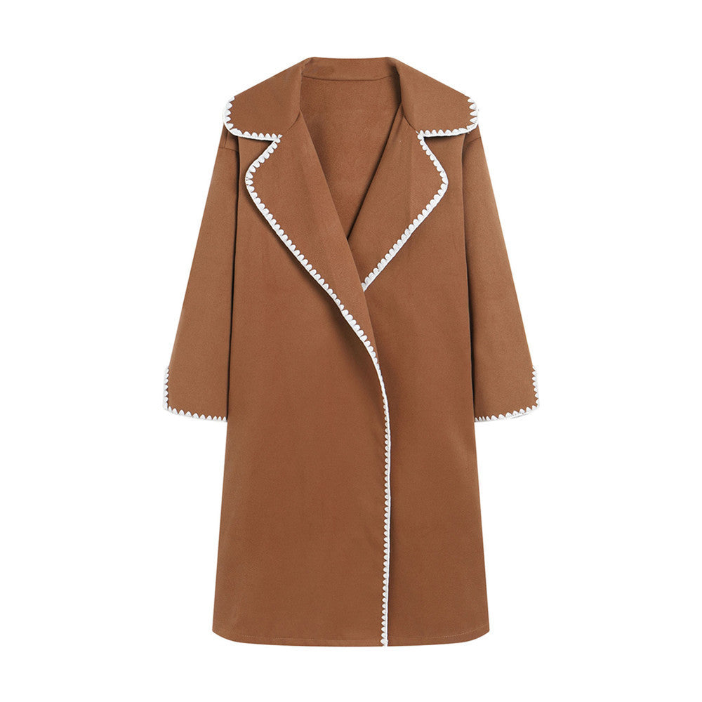 Elegant coat for women with a stylish clutch collar and contrasting decorative seams Lune London