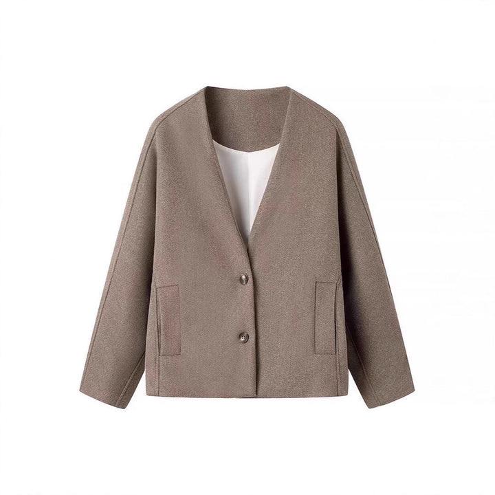 Modern women oversized jacket with elegant button closure treatment Lune London
