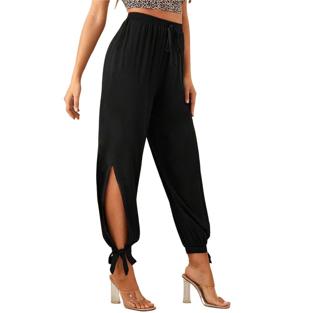 Chic & Stil Elegant women's trousers with side slits and drawstring