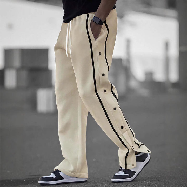 Stylish men's sports pants with snap button details and side pockets Lune London