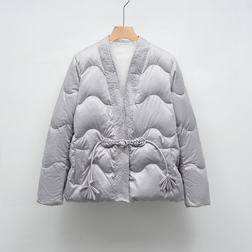 Ladies oversized quilted jacket with drawstring waist and elegant structure Amarae