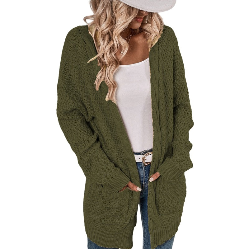 Ladies Large knitted cardigan with an elaborate stitch pattern and practical pockets Lune London