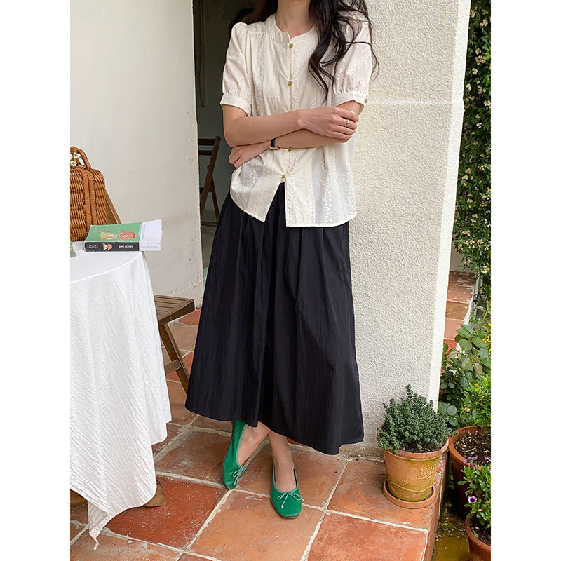 Women's playfully designed blouse with button details Chic & Stil