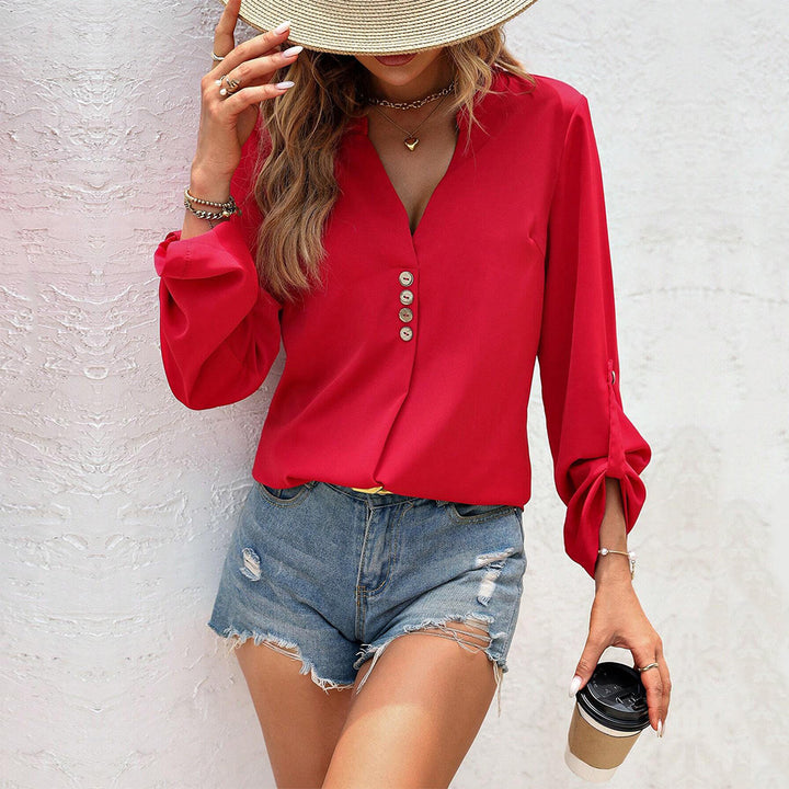 Blouse pour femmes avec des détails de boutons élégants et un chic col en V Chic & Stil