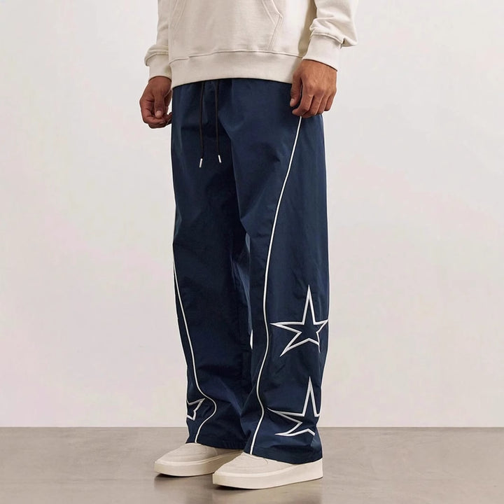Sport leisure pants for men with chic and stylish side appliqués