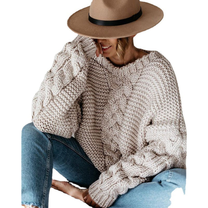 Pull femme en tricot épais avec des manches volumineuses et un design en cable Chic & Stil