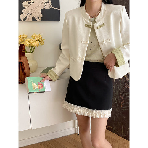 Women's elegant short jacket with decorative buttons Chic & Stil