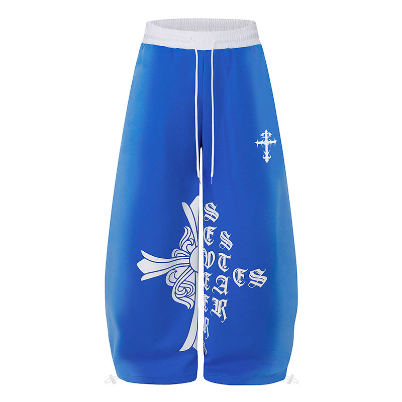 Women's extra-wide culotte sweatpants in palazzo style with a high comfort waistband, drawstring, and gothic cross print Amarae