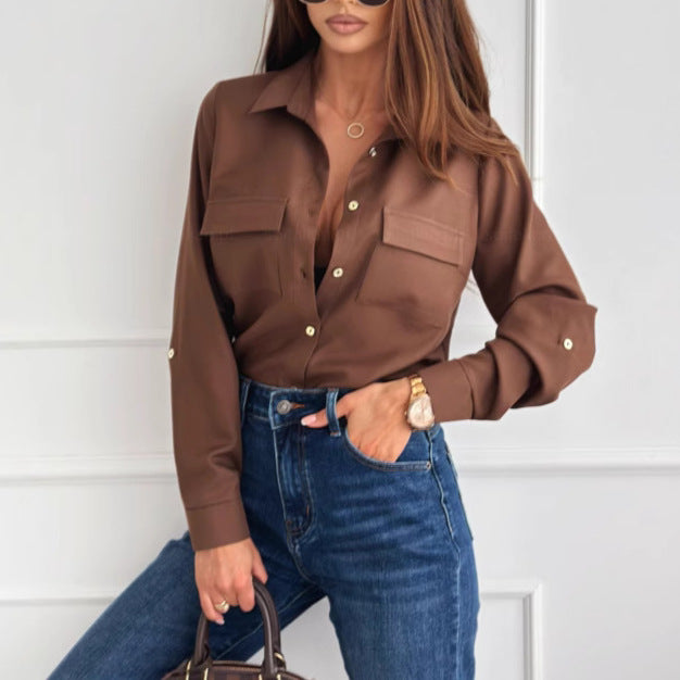 Elegant blouse for women with practical chest pockets and a chic stylish cut