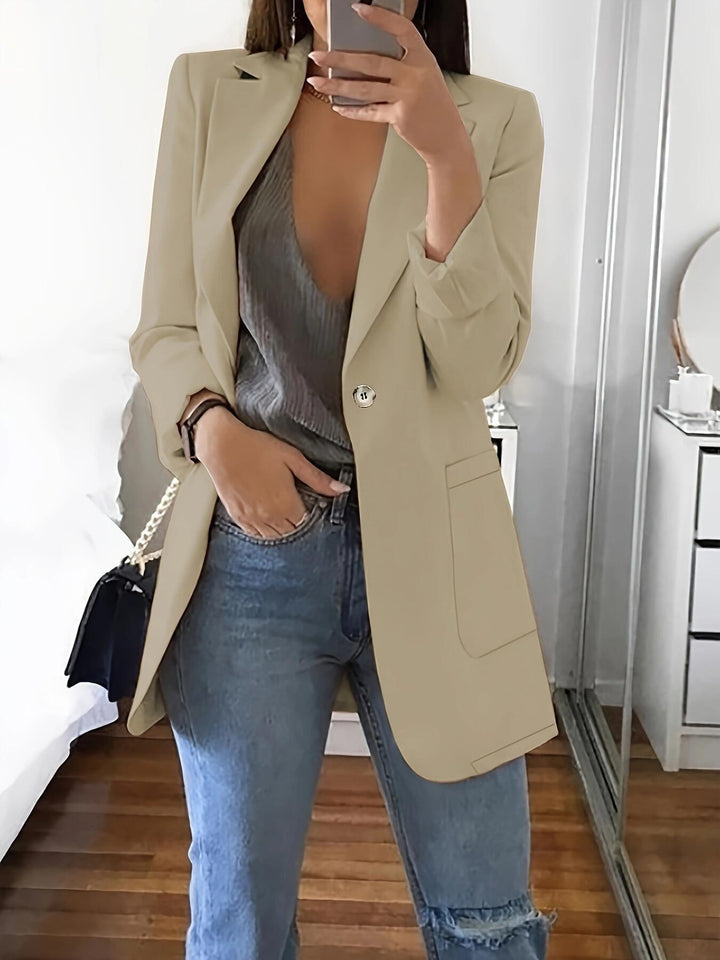 Elegant women's blazer jacket with shiny button details and spacious pockets Lune London