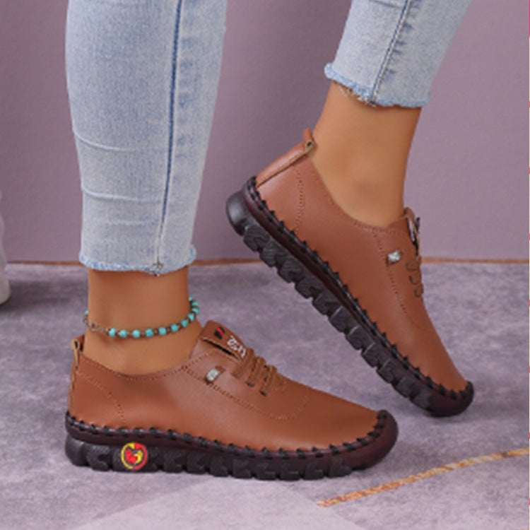 Women's lightweight, soft slip-on with hand-stitched rubber sole and elastic lacing Amarae