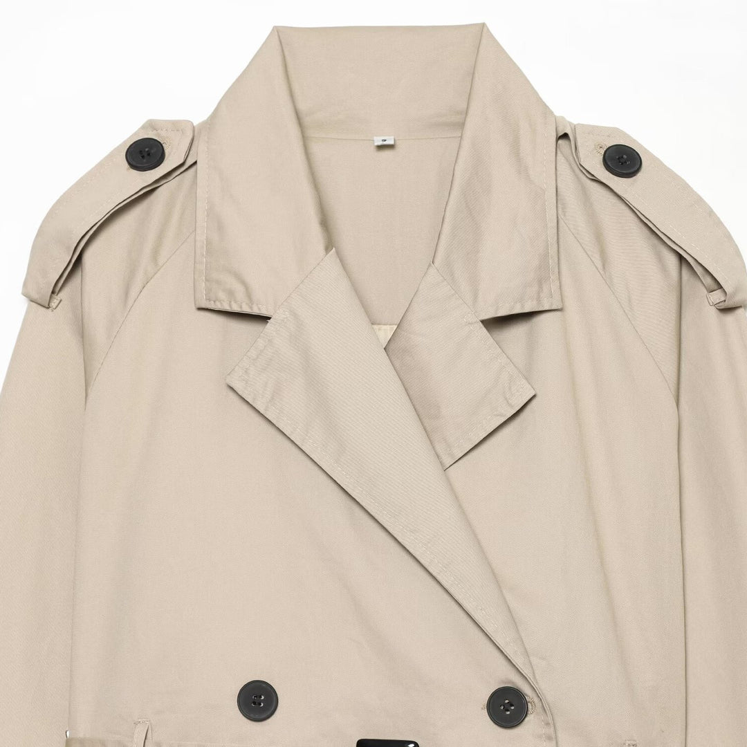 Women's short blouson trench coat with double-breasted button placket, shoulder epaulets, and waist belt Amarae