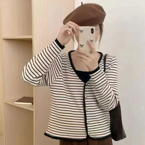 Ladies striped cardigan with elegant buttons and modern V-neck