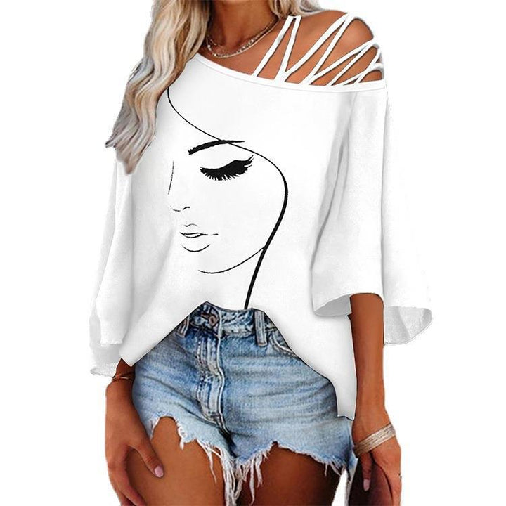 Women's tunic with asymmetric strap design and stylized face graphic Lune London