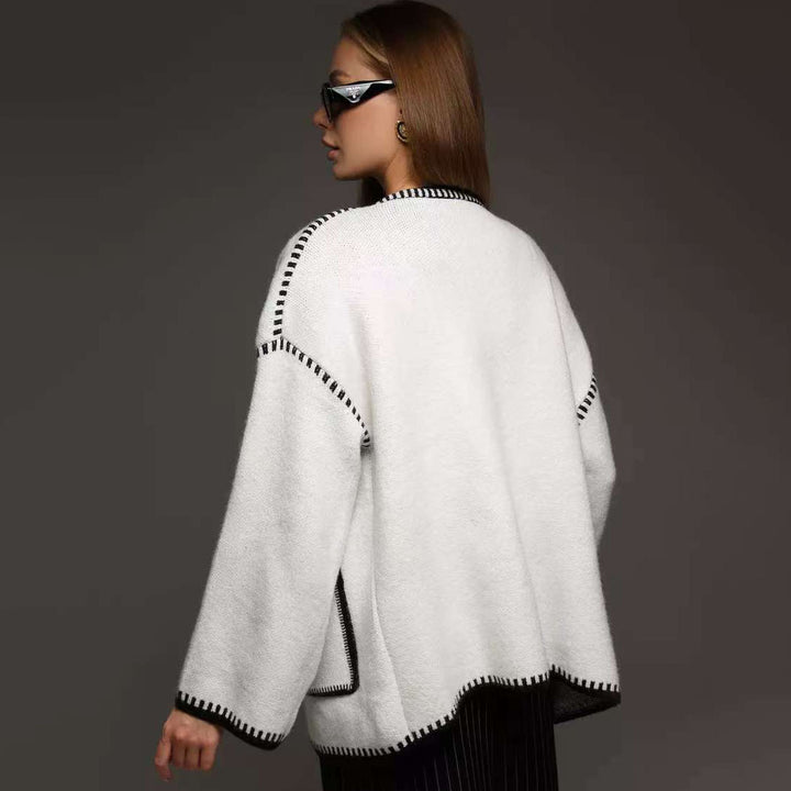 Loose fit knitted women's jacket with decorative belt Lune London