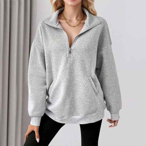 Sweat-shirt décontracté pour femmes avec une demi-fermeture éclair et poches pratiques Chic & Stil