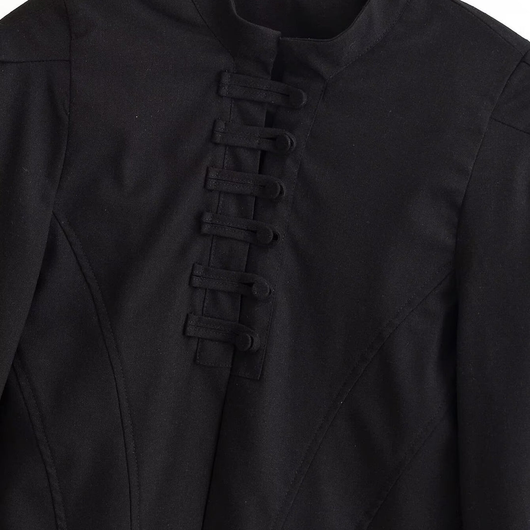 Women's cropped short jacket with stand-up collar, boxy silhouette and minimalist yoke.