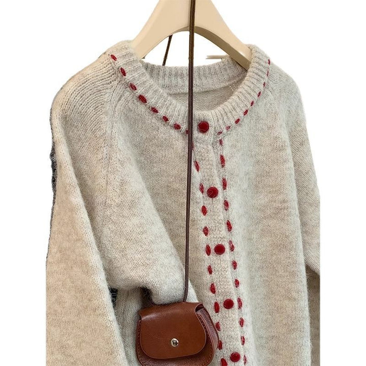 Pull en tricot douillet pour femmes avec détails de boutons colorés Chic & Stil