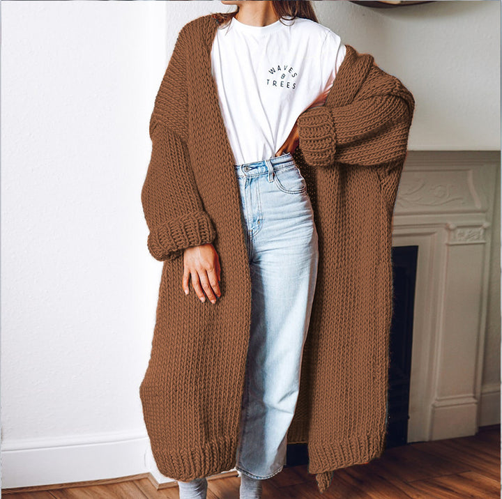 Women Large knitted coat with deep pockets and voluminous sleeves Lune London