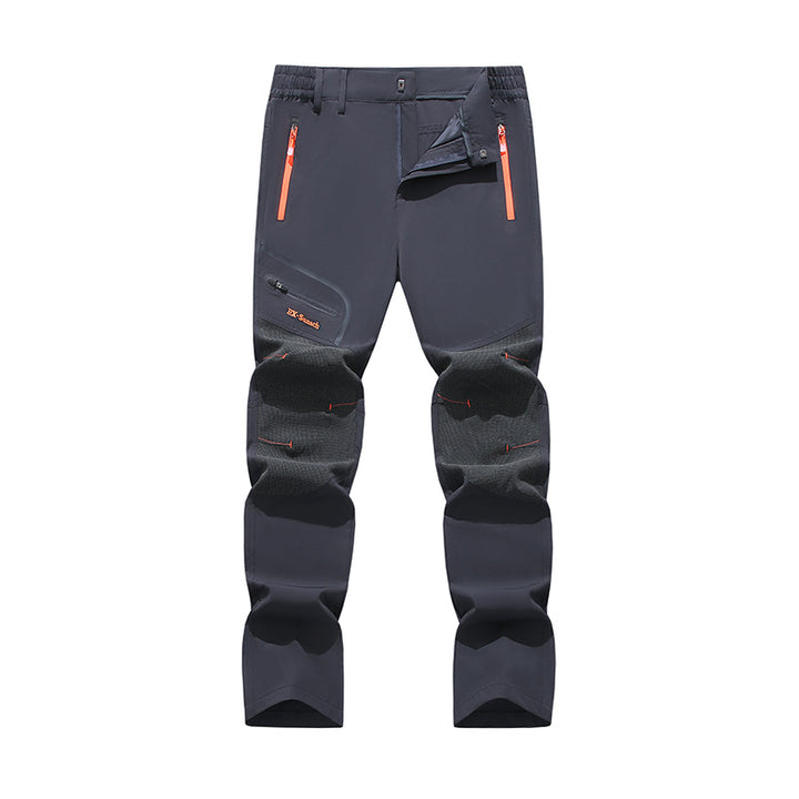 Men's softshell outdoor pants with reinforced knee sections, zippered pockets, and elastic waistband Amarae
