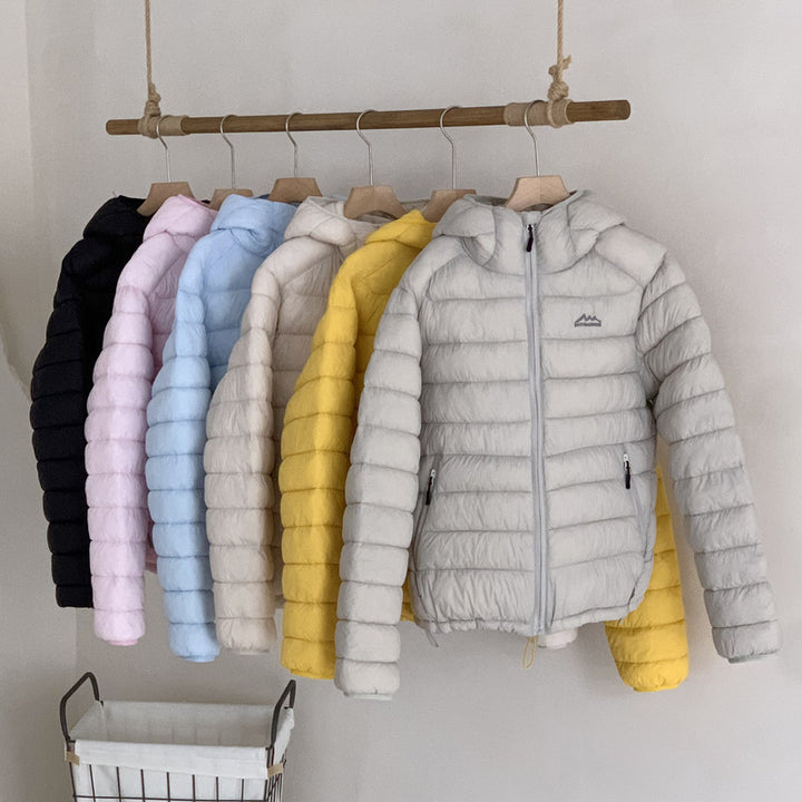Ladies ultralight down jacket with removable hood and elastic hem Lune London