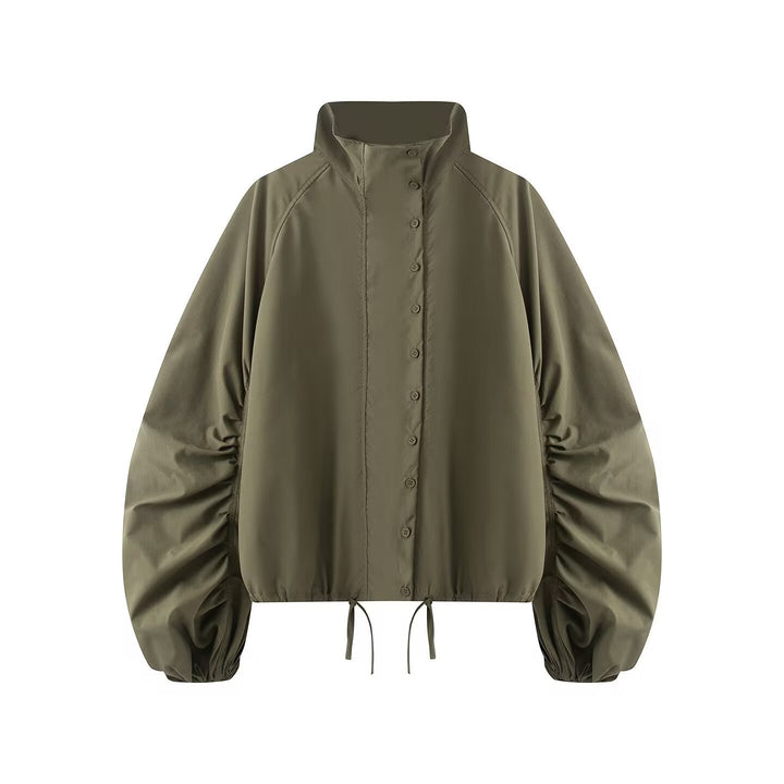 Women's transitional jacket with wide balloon sleeves, stand-up collar and drawstring.