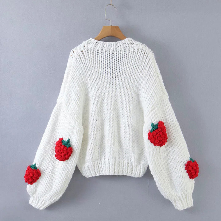Knitted jacket for women with a fruity design and playful buttons Lune London