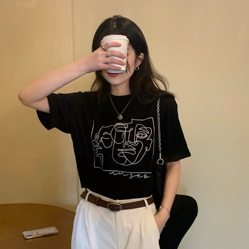 Women's graphic t-shirt with modern line art design and casual fit