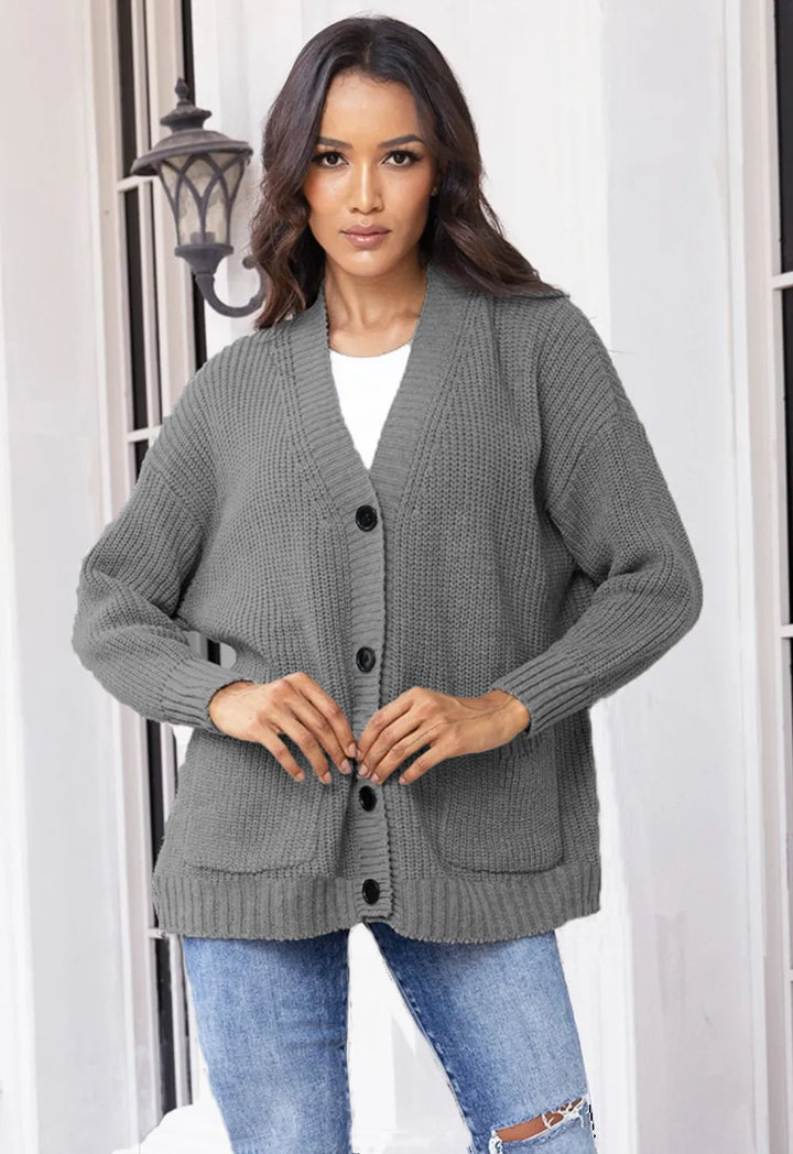 Ladies chunky knit cardigan with large pockets and modern button design Chic and Still