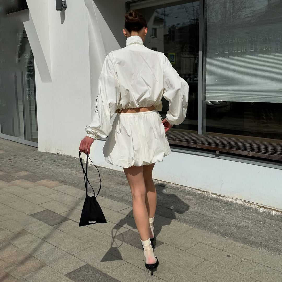 Elegant transitional jacket for women with elastic collar and playful cut Lune London