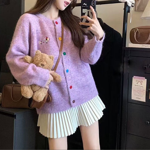 Knitted jacket for women with colored buttons and an embroidered pattern Amarae