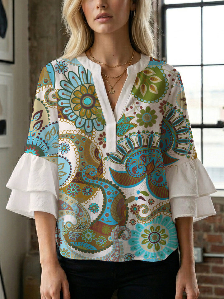 Women's blouse with voluminous ruffle sleeves and creative floral design Lune London