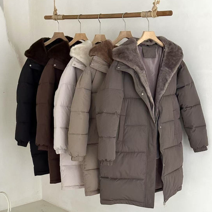 Ladies elegant winter padded parka with faux fur collar and practical pockets Lune London