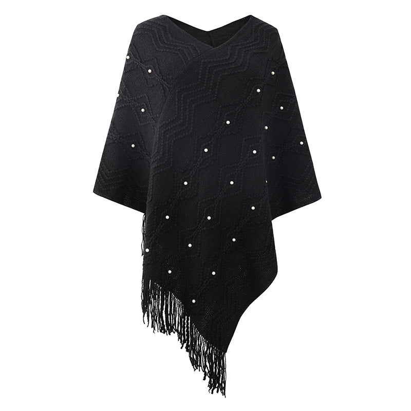 Lune London Elegant poncho for women with a striking textured pattern and decorative fringes