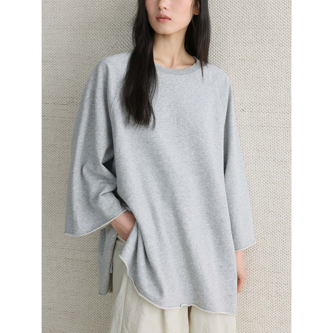 Women's Oversized Sweatshirt with Raw Neckline and Wide Raglan Sleeves Amarae