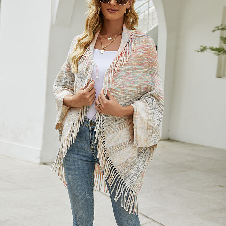 Trendy women's poncho with fringed hem and structured design Lune London