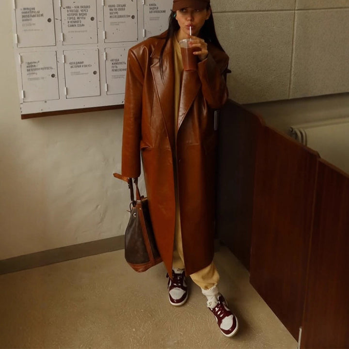 Women's long-cut patent leather trench coat with lapel collar and boxy oversized fit Amarae