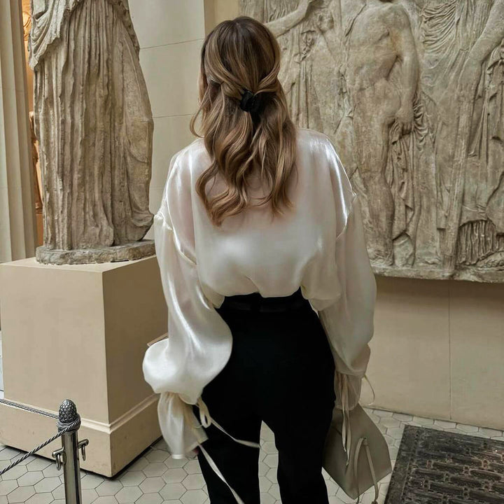 Elegant satin blouse for women, with voluminous sleeves and tying details Lune London