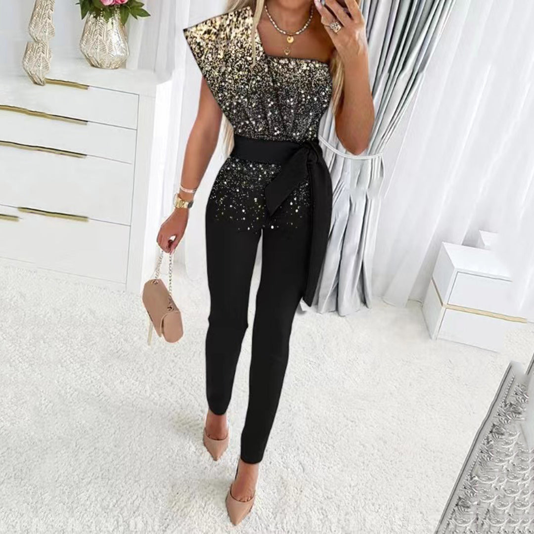 One-shoulder jumpsuit for women with a sparkling top and a chic waist belt und Stil
