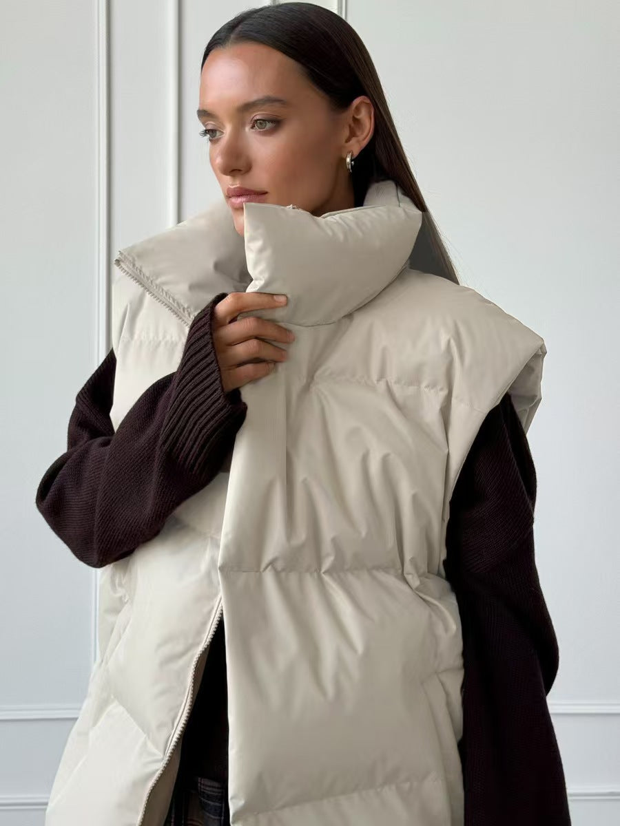 Ladies padded vest with high collar and pockets Amarae