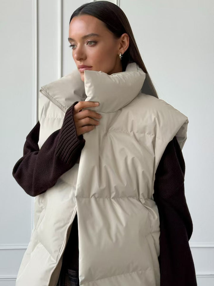 Ladies padded vest with high collar and pockets Amarae