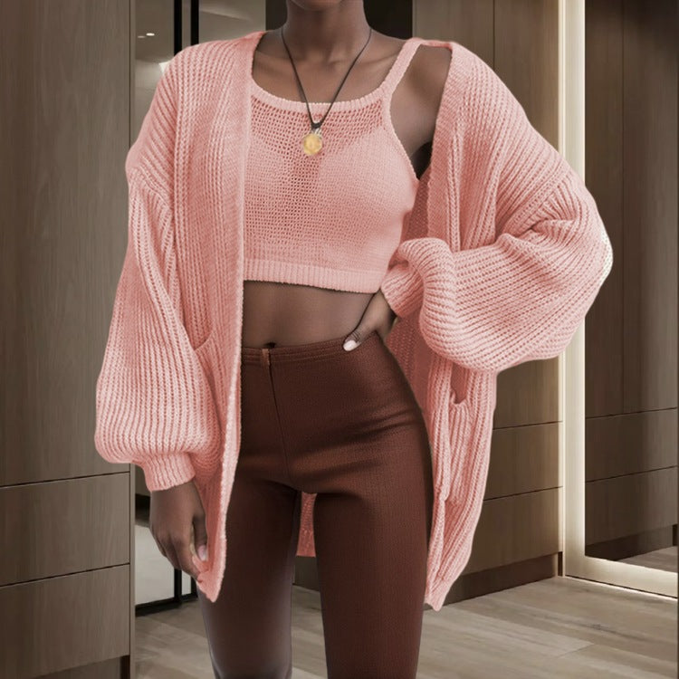 Cardigan pour femmes en tricot épais avec des manches volumineuses et des poches pratiques Chic & Stil