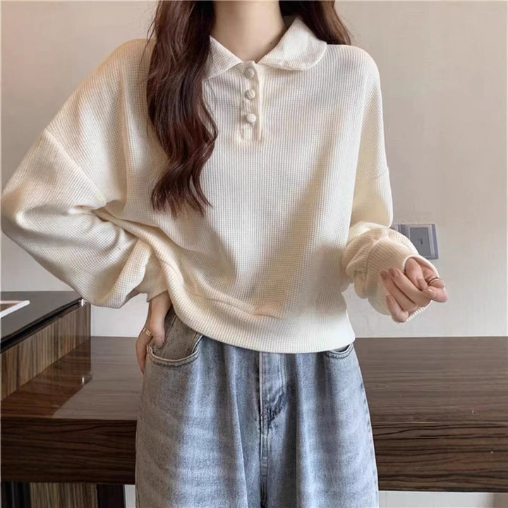 Pull polo décontracté pour femmes avec détails de boutons Chic & Stil
