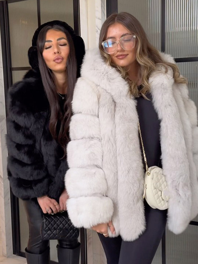Ladies short coat made of faux fur with voluminous panels and shawl collar Amarae