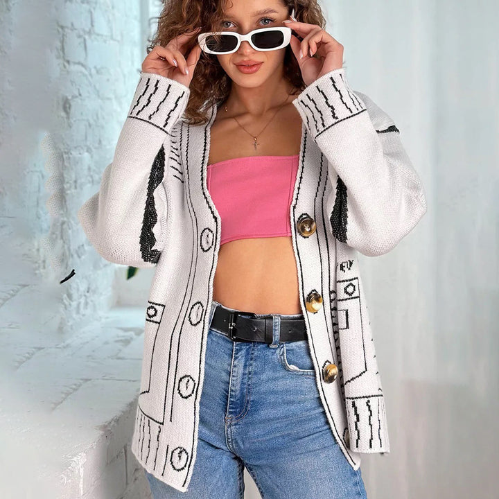 Modern knitted jacket for women with asymmetrical design and decorative buttons Lune London