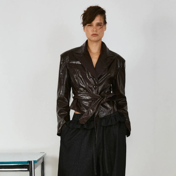 Women’s short blazer in patent leather look with waist belt and flowing lapel Amarae